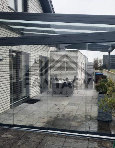 Terrassenüberdachung mit Glasschiebeelement & Keilfenster
